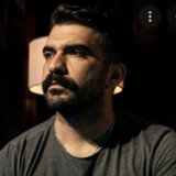 Алпхан Куртоğлу