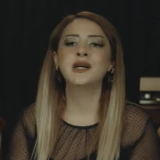 Аслы Айдоğан