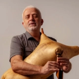 Бирол Топалоğлу