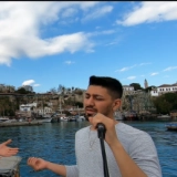 Окан Коcаоз