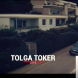 Толга Токер