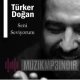 Туркер Доğан